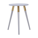Light grey round side table with three tapered legs, two of which are light grey and one is natural wood, creating a modern and minimalist design suitable for various home decor styles