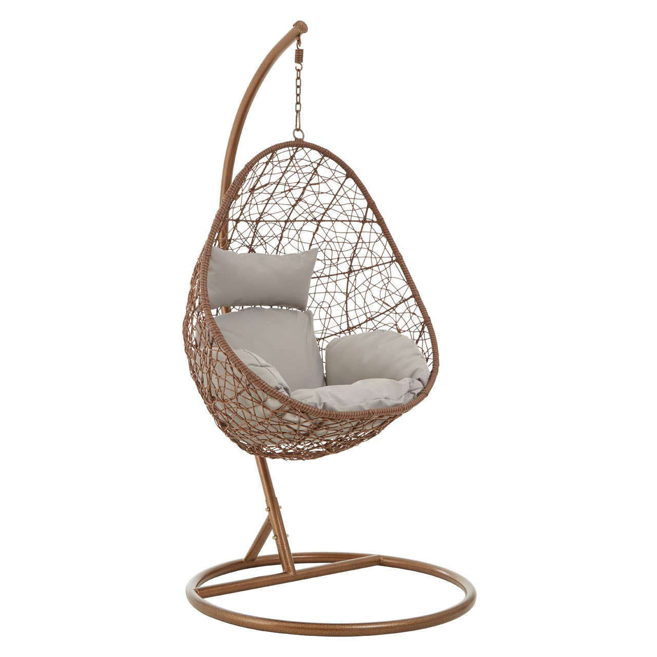 A brown rattan hanging chair with a unique teardrop shape, featuring a cushioned seat in a light gray fabric. The chair is suspended from a curved metal stand, which has a circular base for stability. The woven rattan design showcases an intricate pattern, adding a stylish touch to the overall look