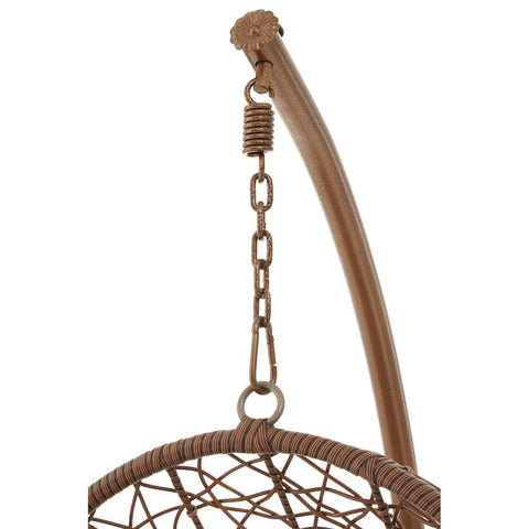 Brown rattan hanging chair with a curved wooden support and a metal chain for suspension, featuring a woven design that creates an open, airy look