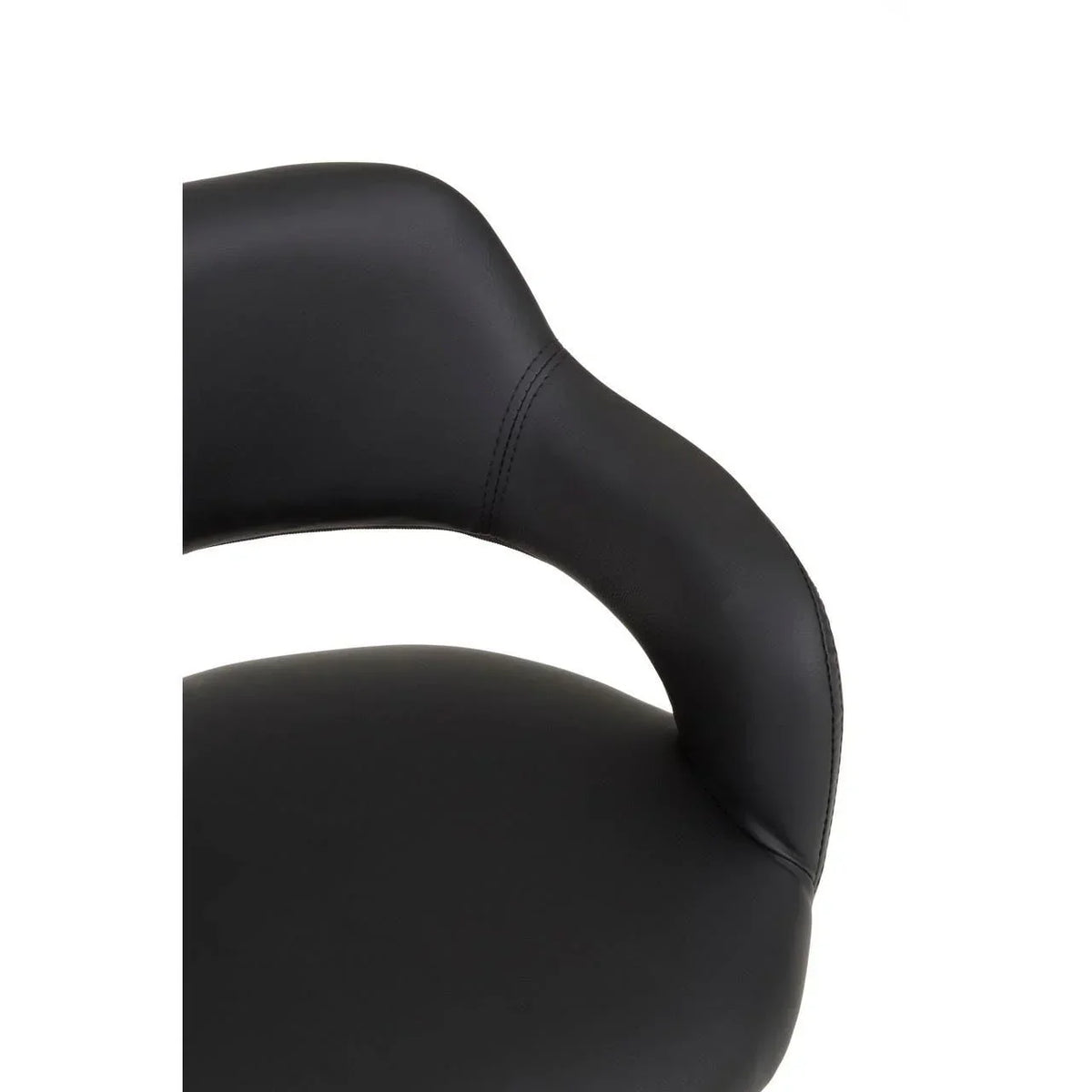 Close-up of black faux leather dining chair with curved backrest and stitched detail