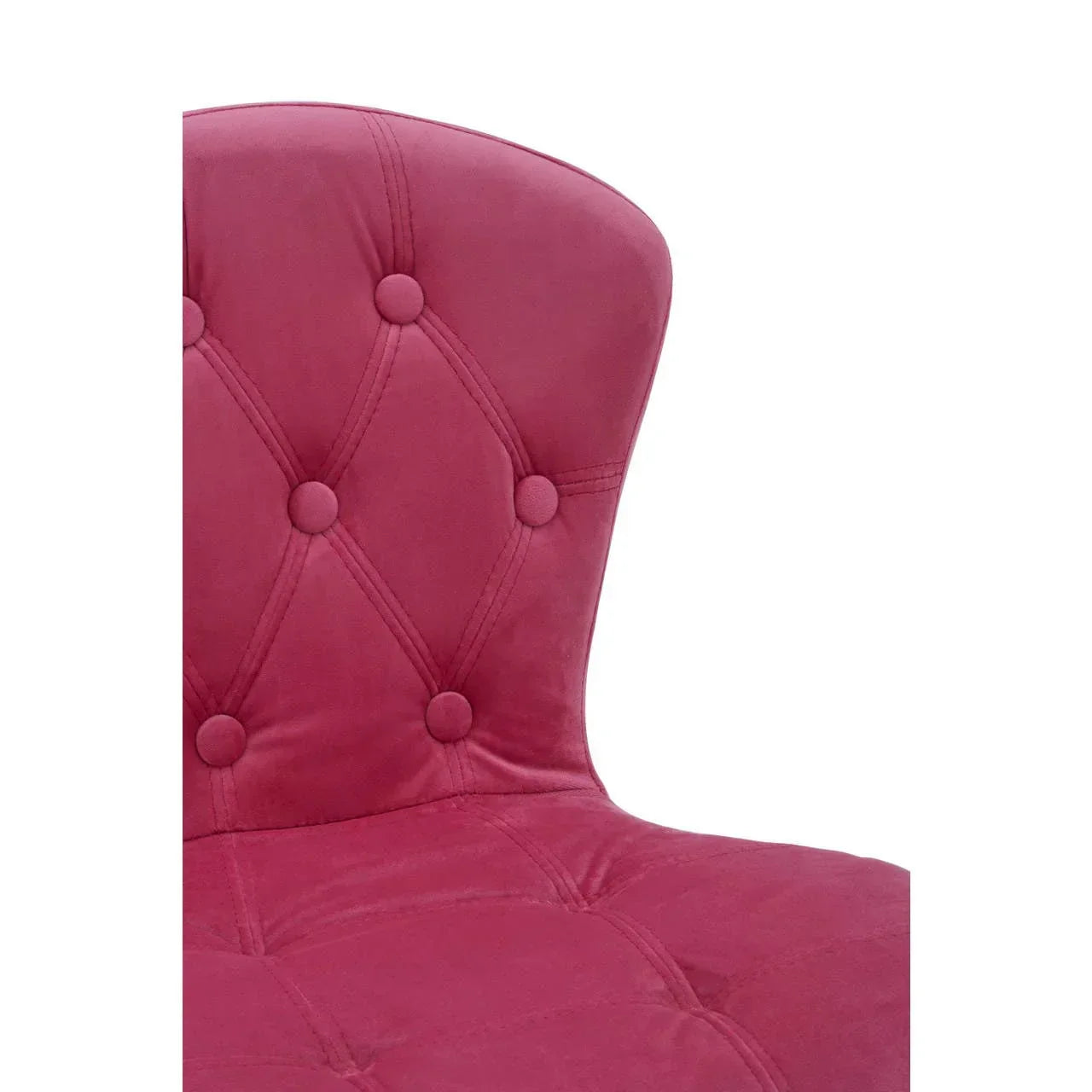 Close up of pink velvet accent chair with button-tufted backrest upholstery
