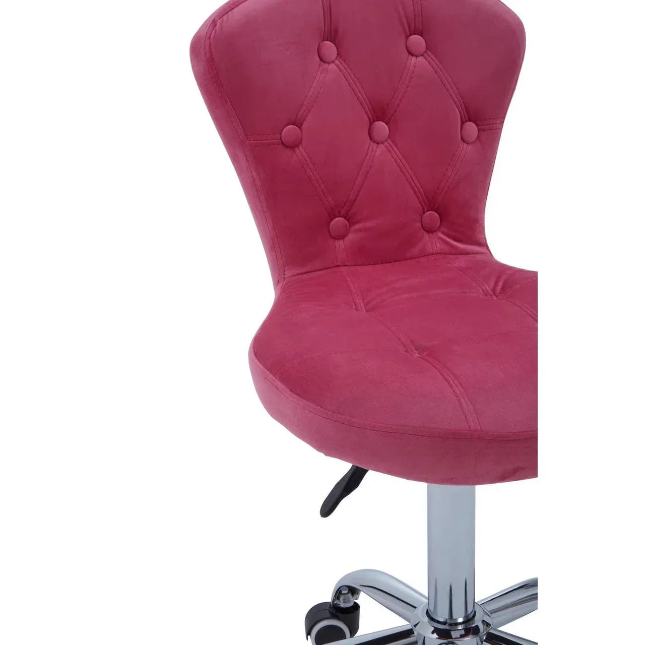 Pink velvet office chair with tufted backrest and chrome swivel base, close-up view