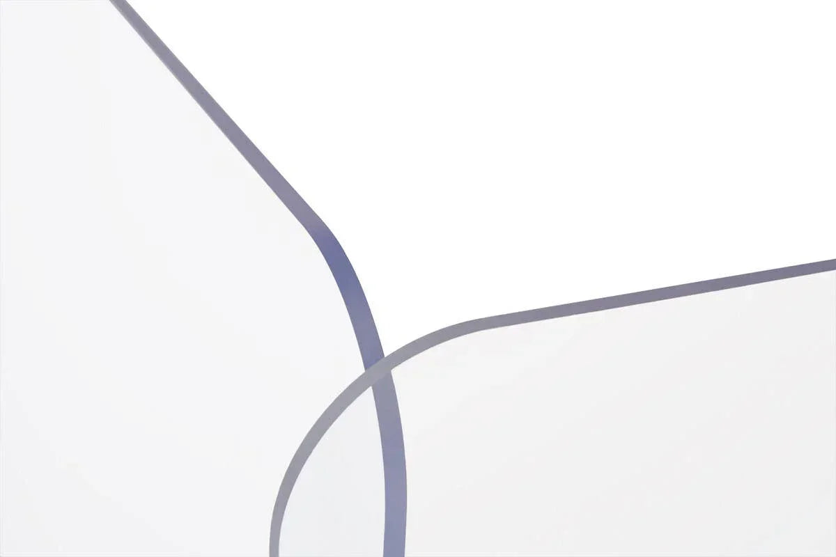 Closeup of clear glass table top with beveled edge and smooth corner detail