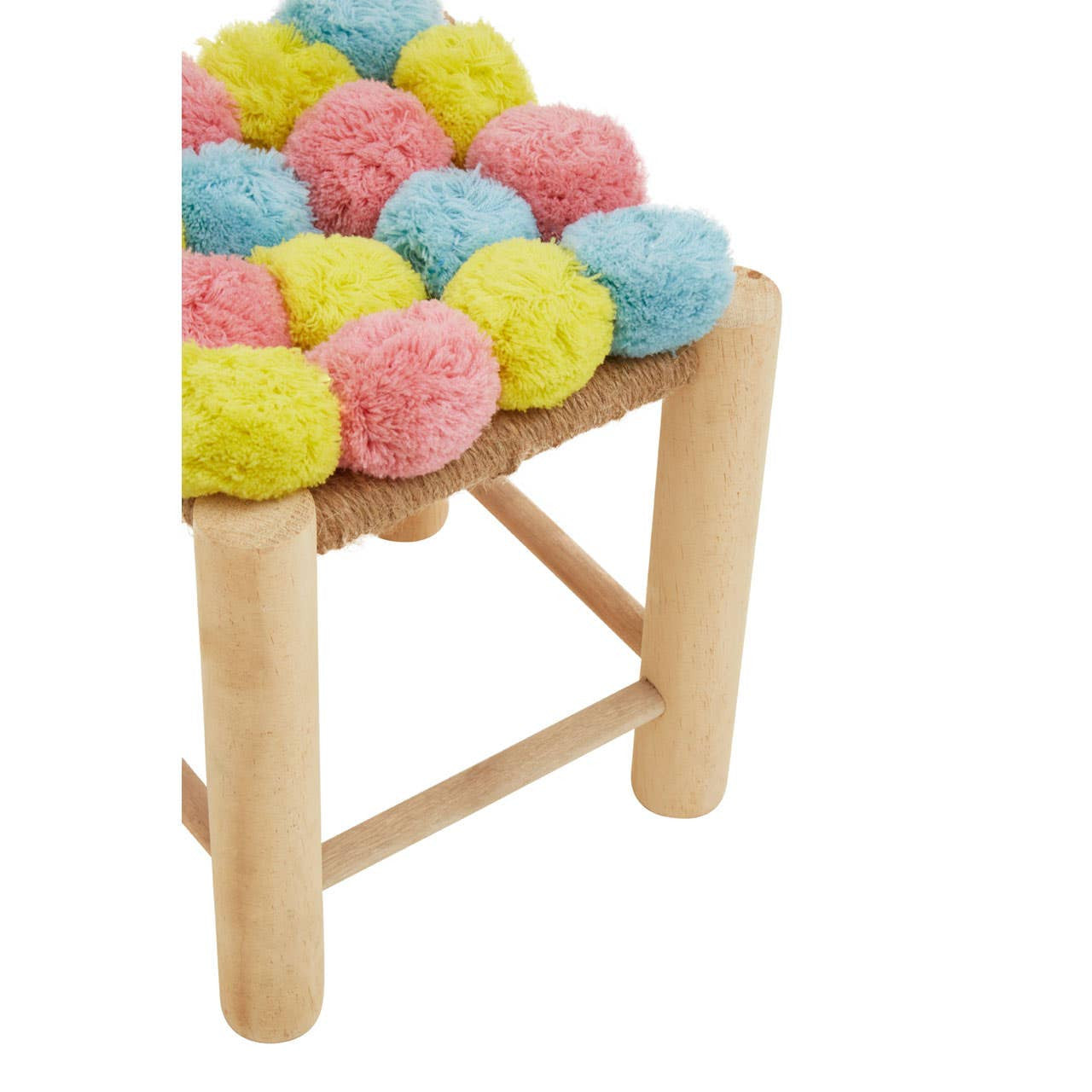 A colorful stool featuring a top covered in pink, blue, and yellow pom poms, supported by light wooden legs. The design is playful and vibrant, suitable for a cheerful home decor