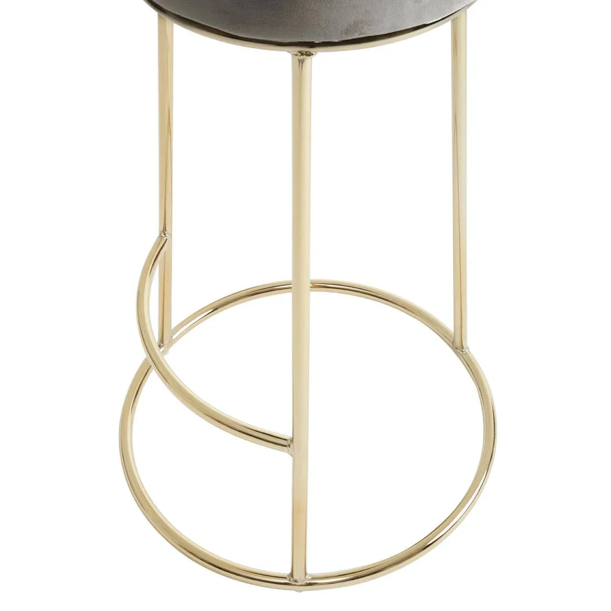 Gold metal bar stool frame with circular footrest and grey velvet seat close-up