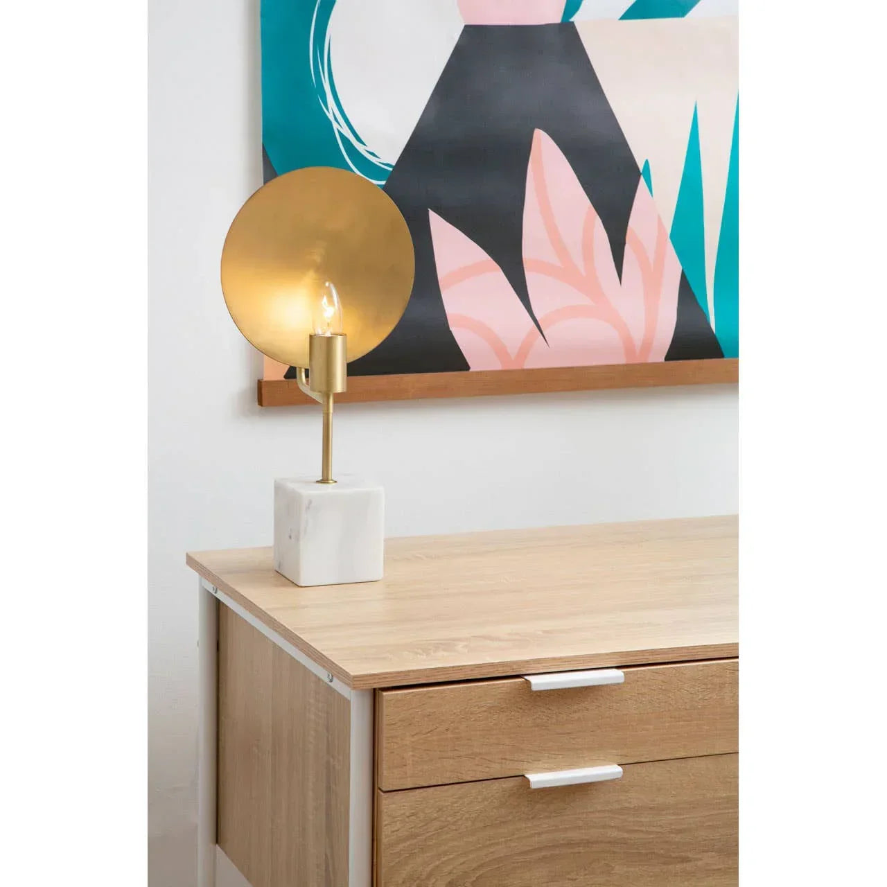 Oak effect desk with two drawers and gold table lamp with marble base