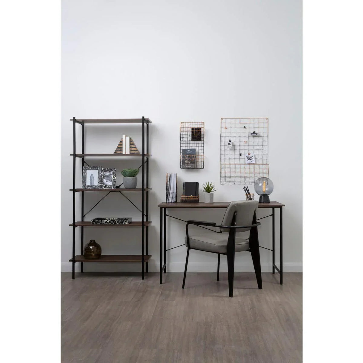 Walnut wood desk with metal legs and grey chair in modern home office setup