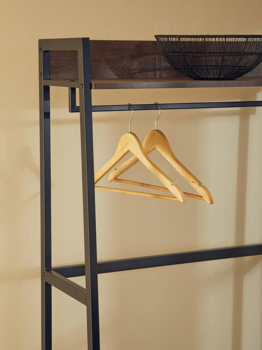 Metal clothes rail with wooden shelf, black wire basket, and wooden hangers