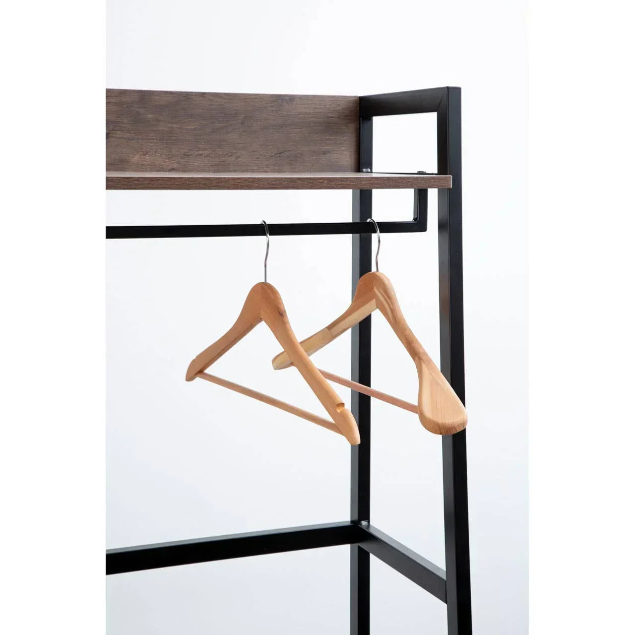 Wood and metal clothes rail with two wooden hangers on black frame