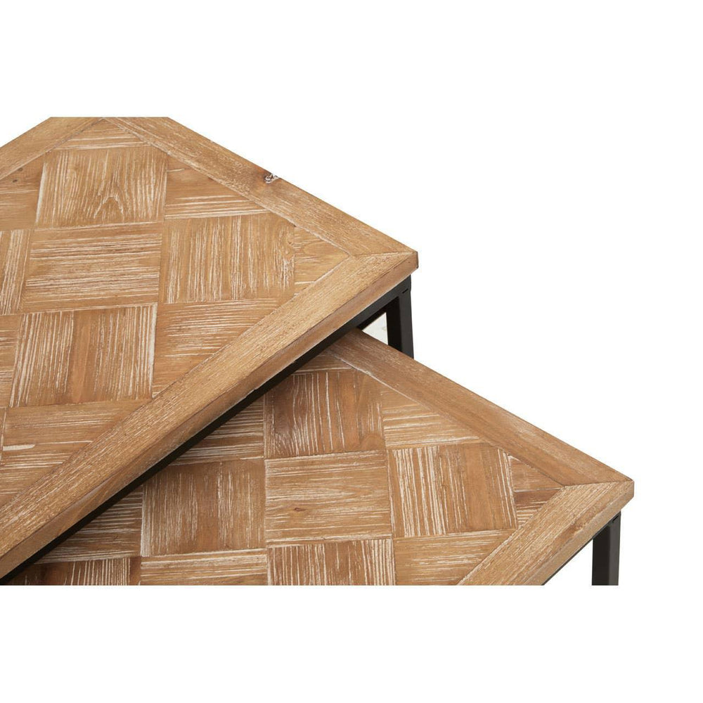 Close-up of wooden coffee table tops with parquet pattern and black metal legs