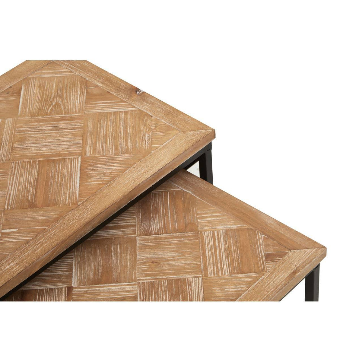 Close-up of wooden coffee table tops with parquet pattern and black metal legs