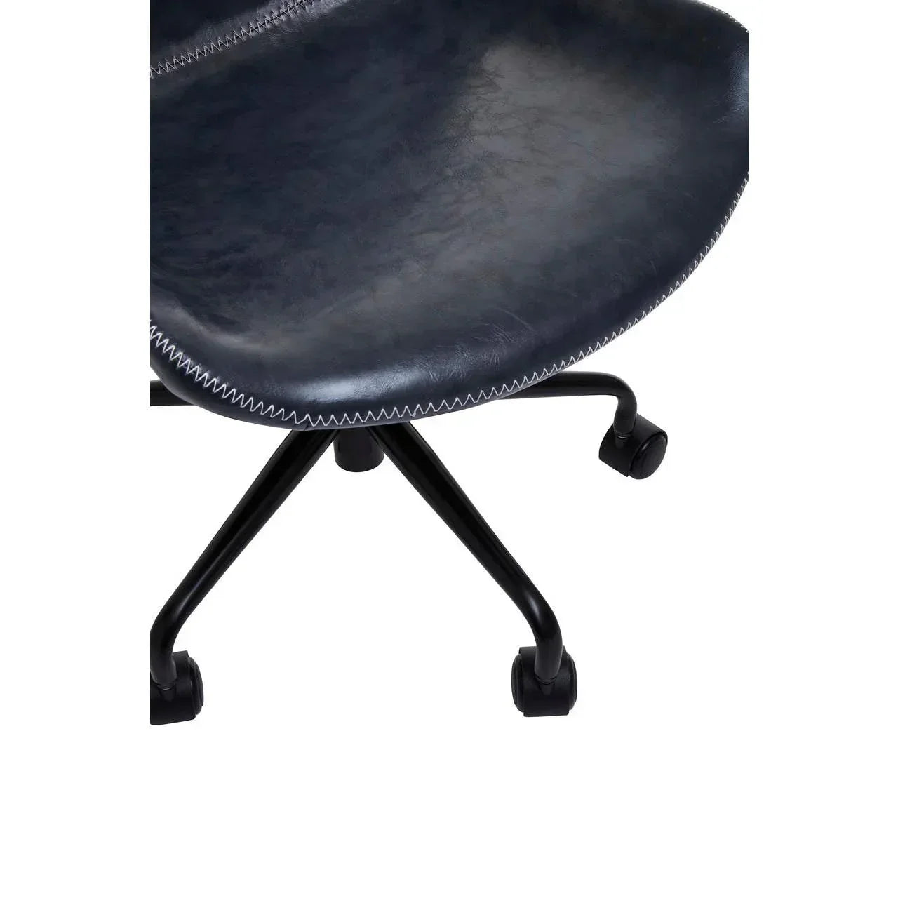 Close-up of black faux leather office chair seat with white stitching and caster wheels