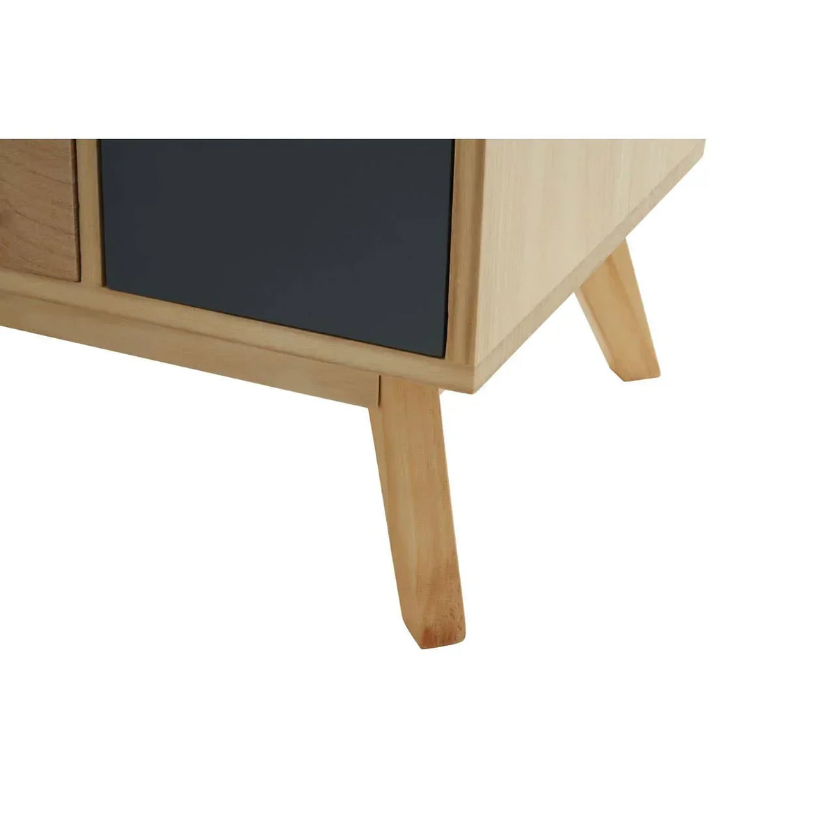 Closeup of wooden furniture leg and navy panel, showing modern cabinet corner detail