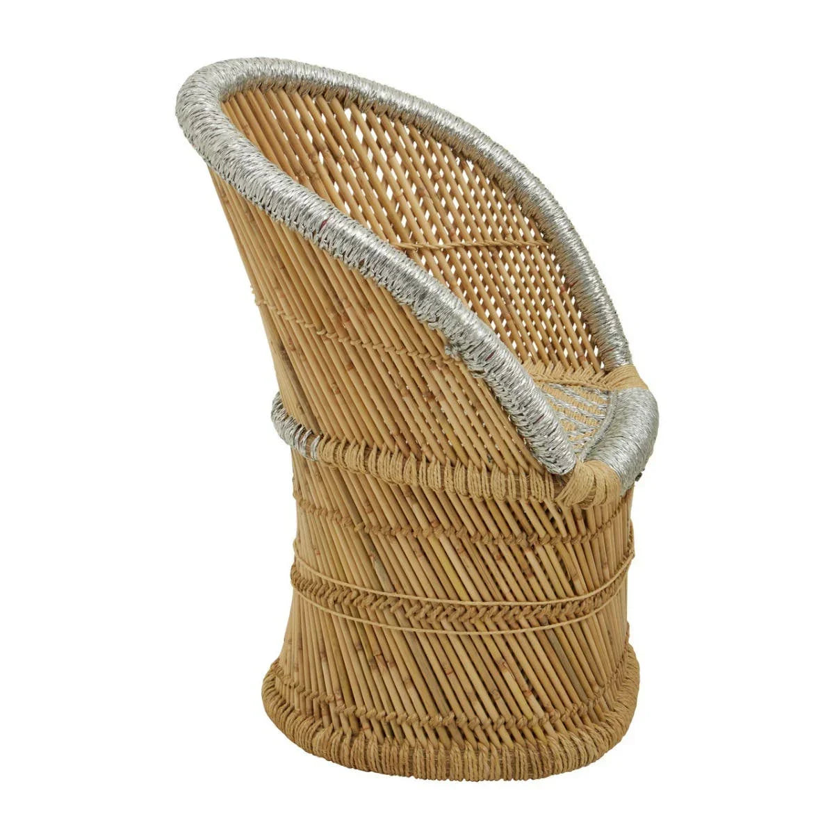 Natural rattan accent chair with silver trim and woven base, side view