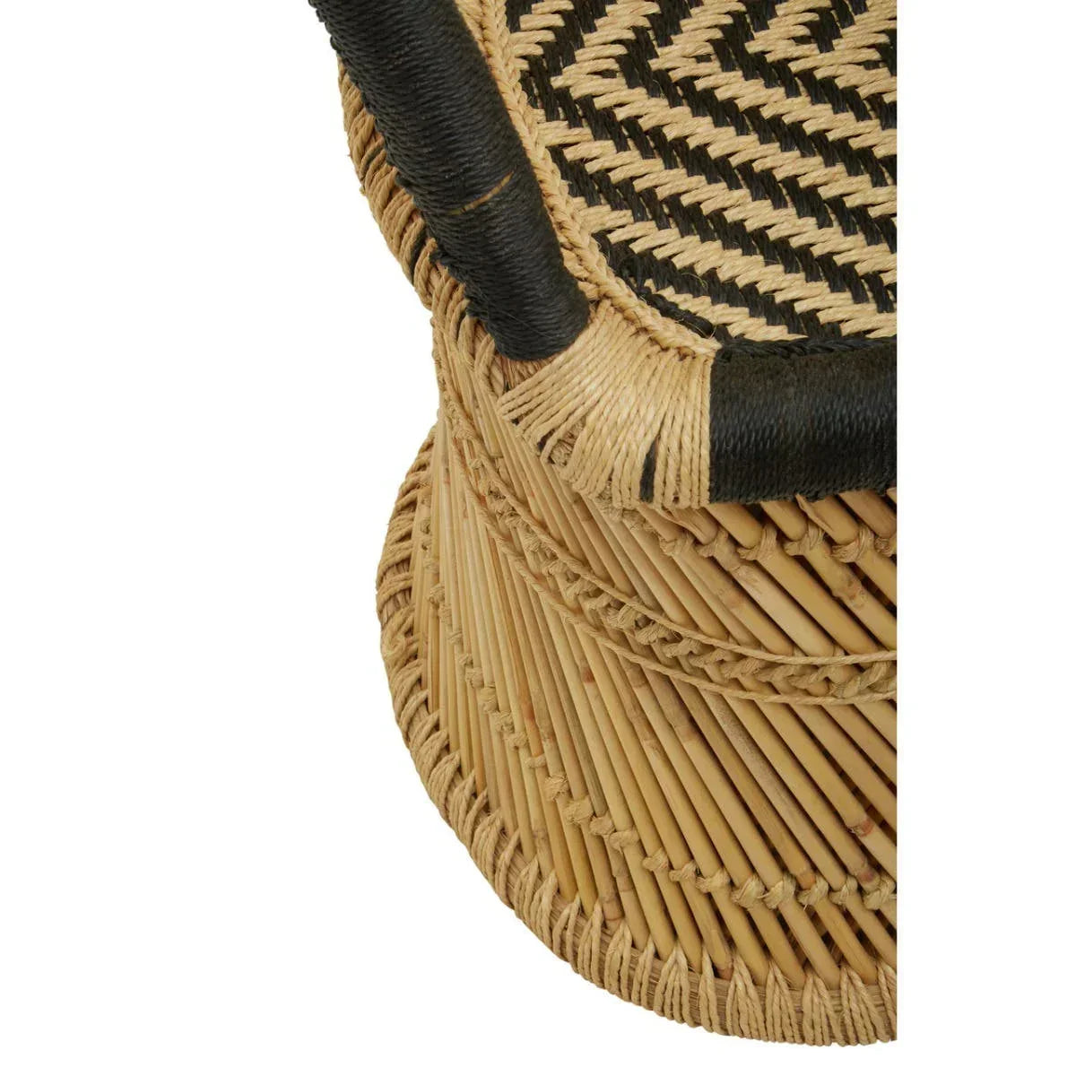 Close-up of woven rattan stool base with black and natural zigzag pattern seat