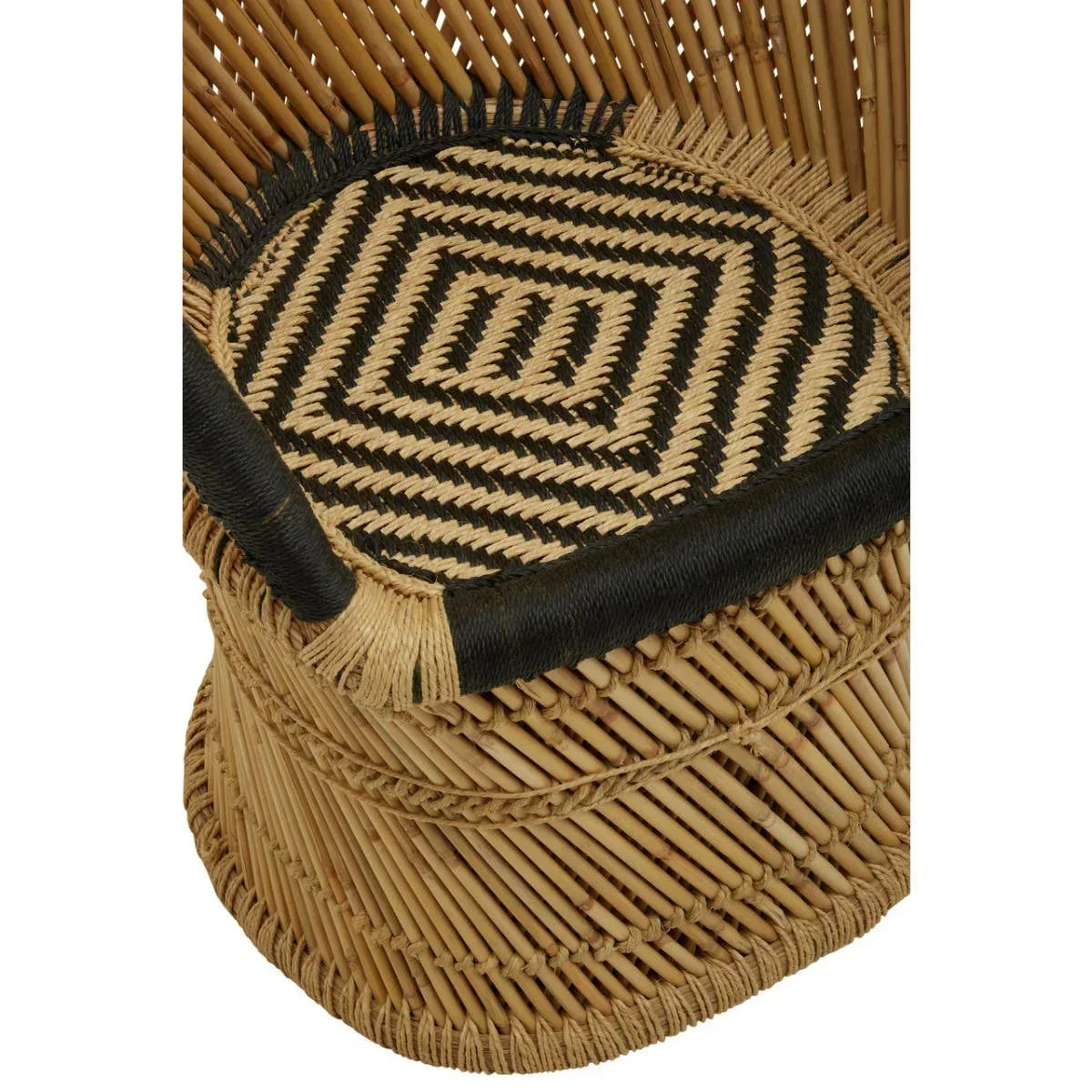 Close view of woven rattan chair seat with geometric black and natural pattern
