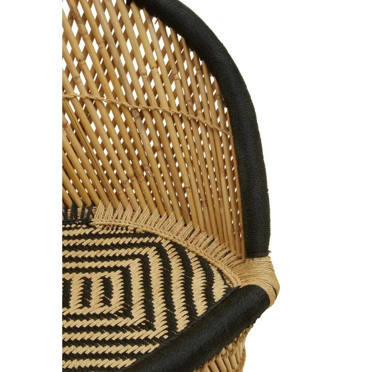 Close-up of rattan chair backrest with black and natural woven seat detail