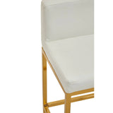 White bar stool with gold metal frame and cushioned seat, close up of corner