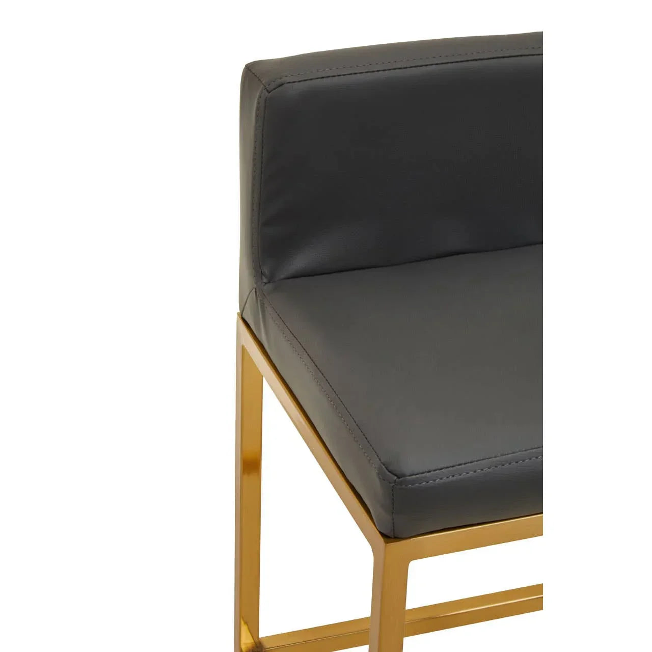 Black faux leather dining chair with gold metal frame and square seat detail