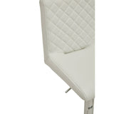 White faux leather dining chair with quilted backrest and chrome legs, close-up view
