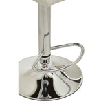 Chrome bar stool base with round footrest and cream seat corner detail