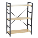 Three-tier shelf unit featuring a light oak effect finish on the shelves and a black metal frame. The design includes cross-bracing for added stability, with open shelving ideal for displaying books or decorative items