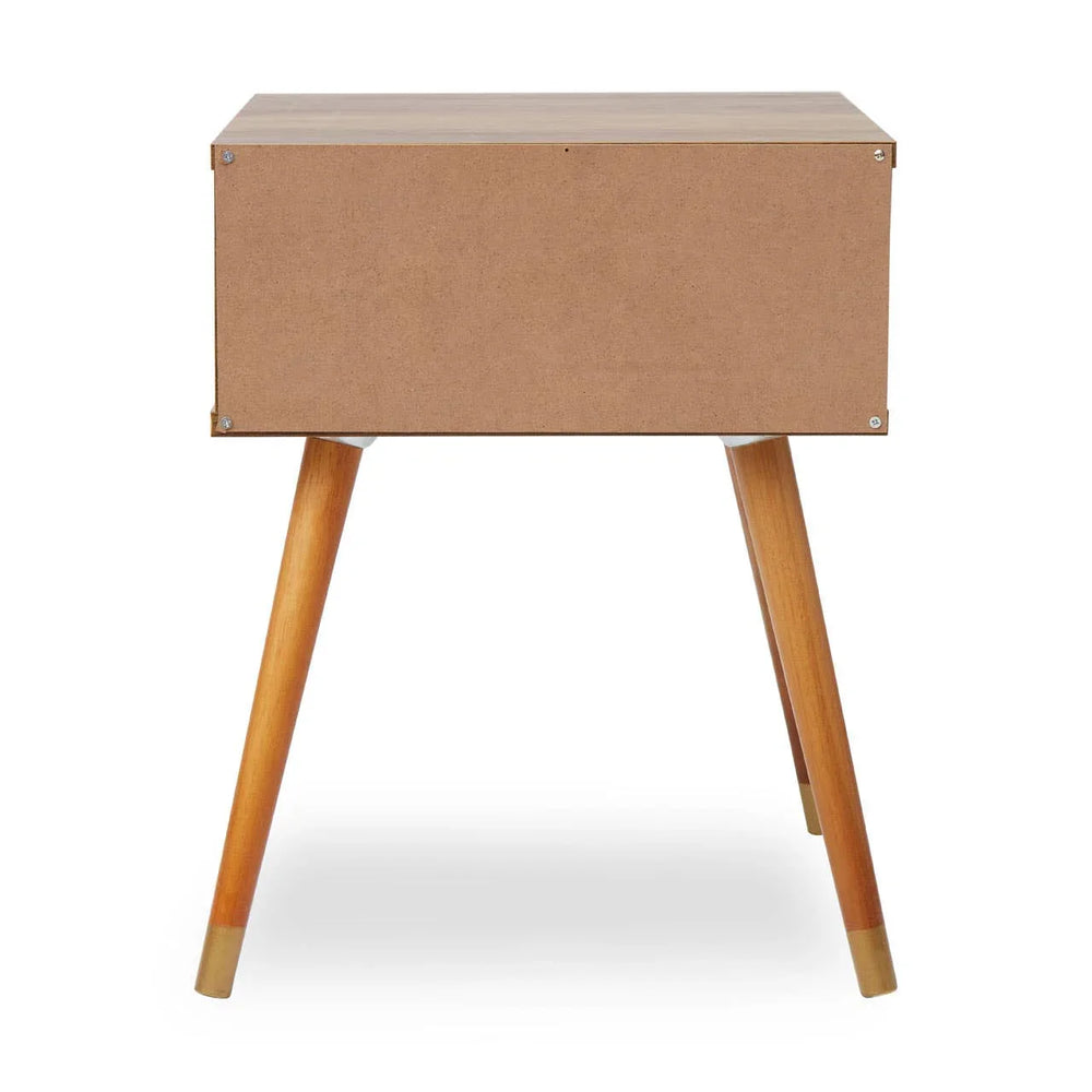 Back view of wooden bedside table with angled legs and plain MDF panel