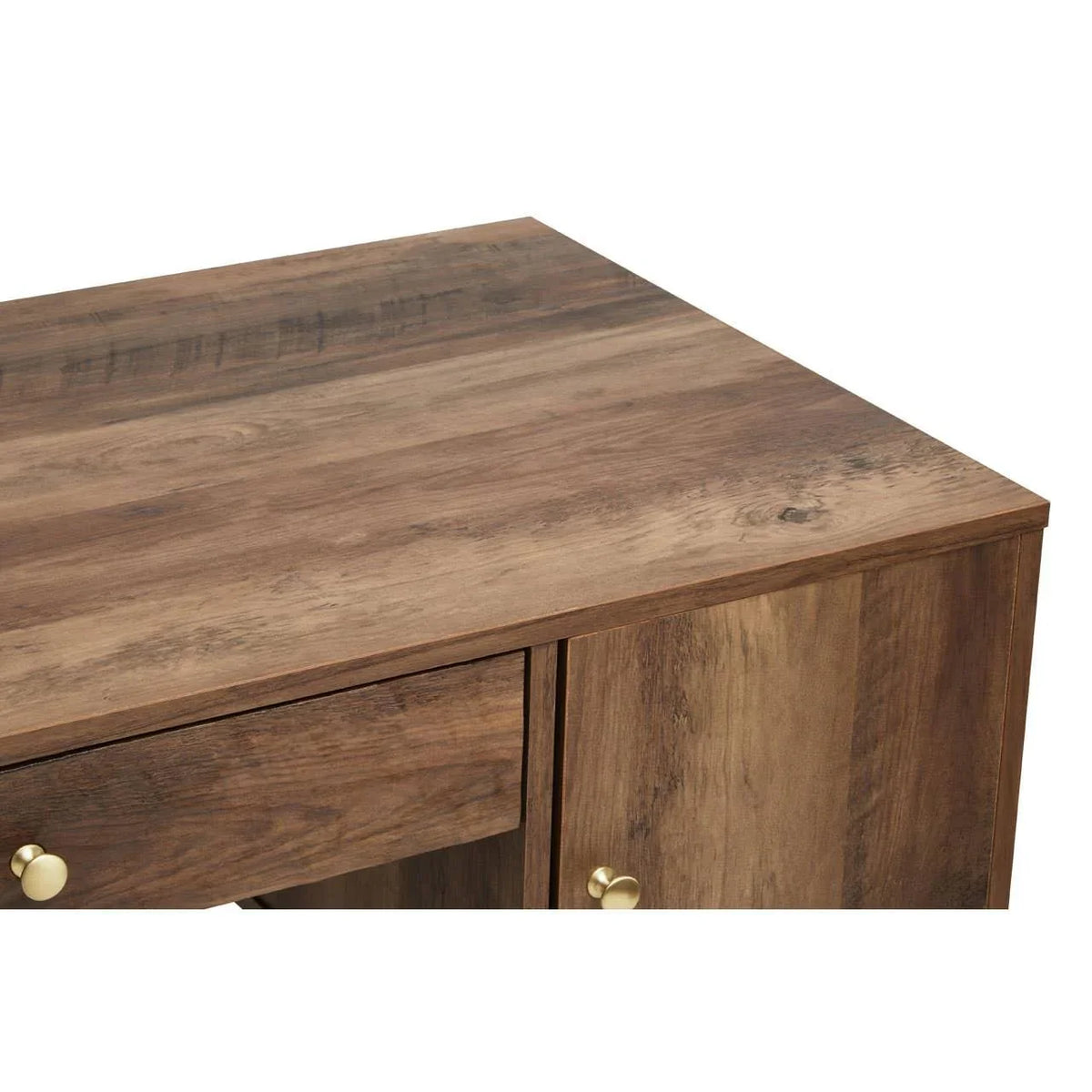 Closeup of wood grain sideboard cabinet with brass handles on drawer and door