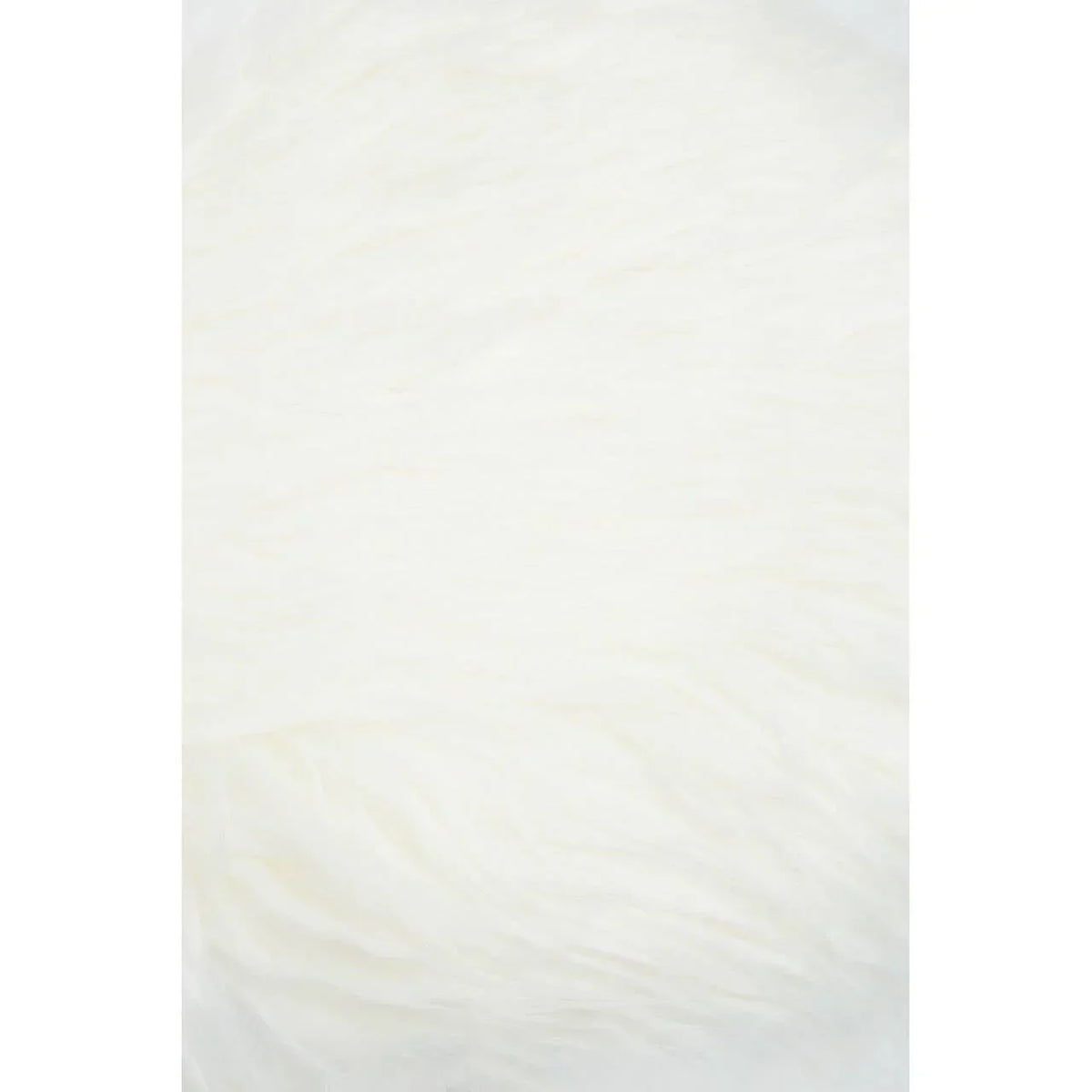 close up of white faux fur rug texture