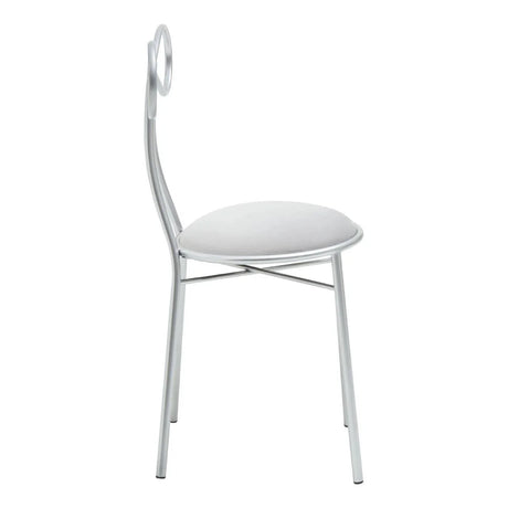 Silver metal dining chair with circular backrest and white padded seat, side view