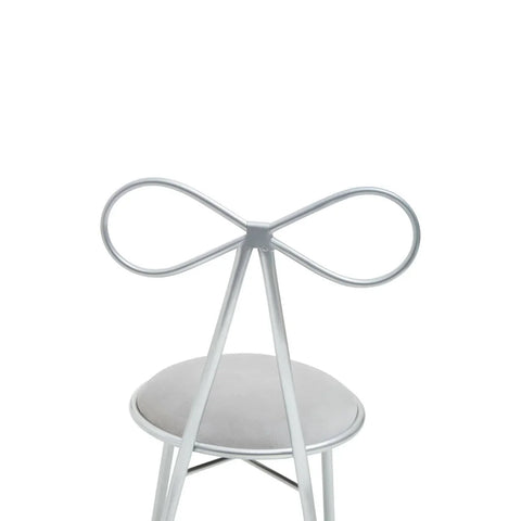 Silver metal chair with bow-shaped backrest and round grey upholstered seat