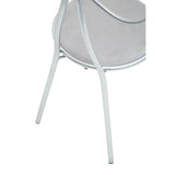 Silver metal chair legs and round grey upholstered seat, close-up detail