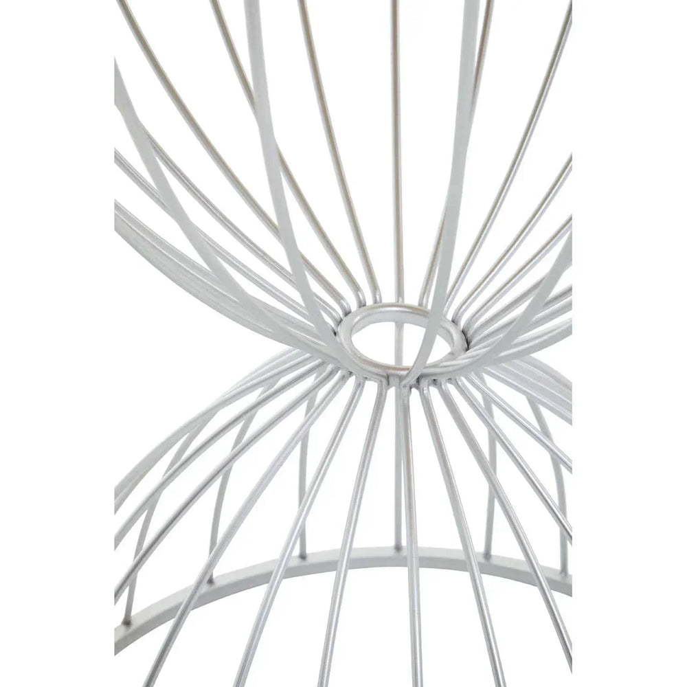Closeup of white metal wire lamp shade with geometric pattern