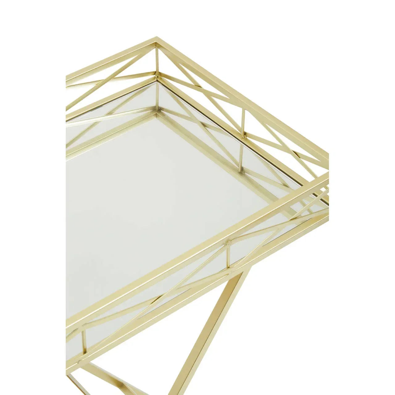 Gold metal and glass side table with geometric frame, close-up of tabletop corner