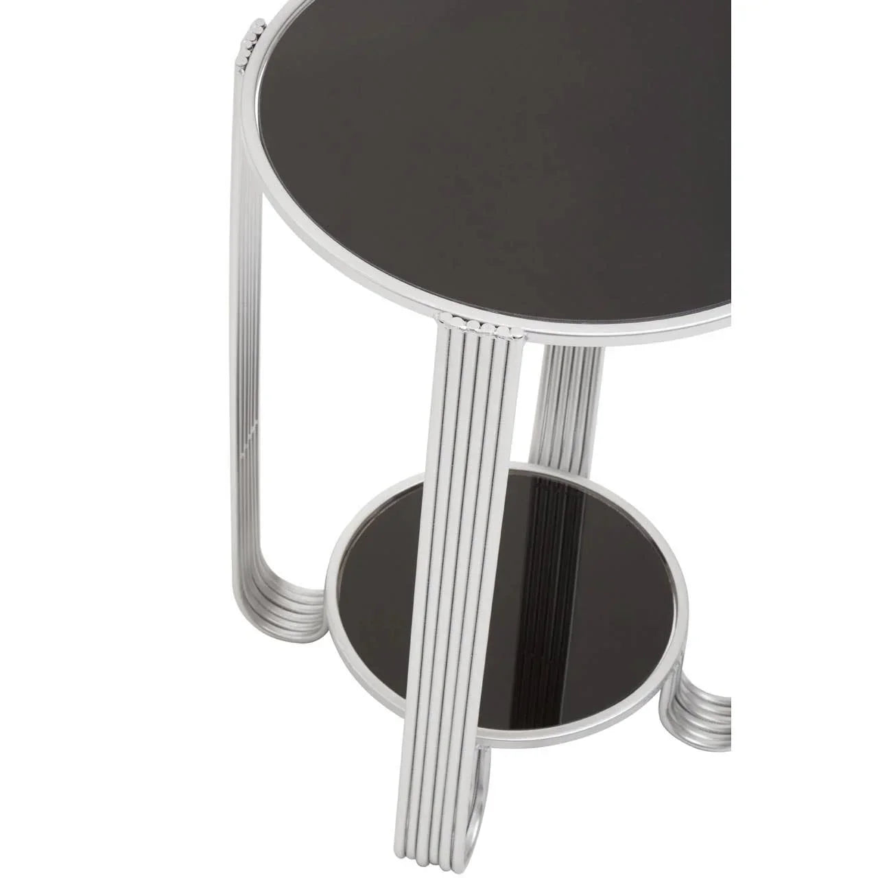Round black glass side table with chrome metal legs and lower shelf, angled top view