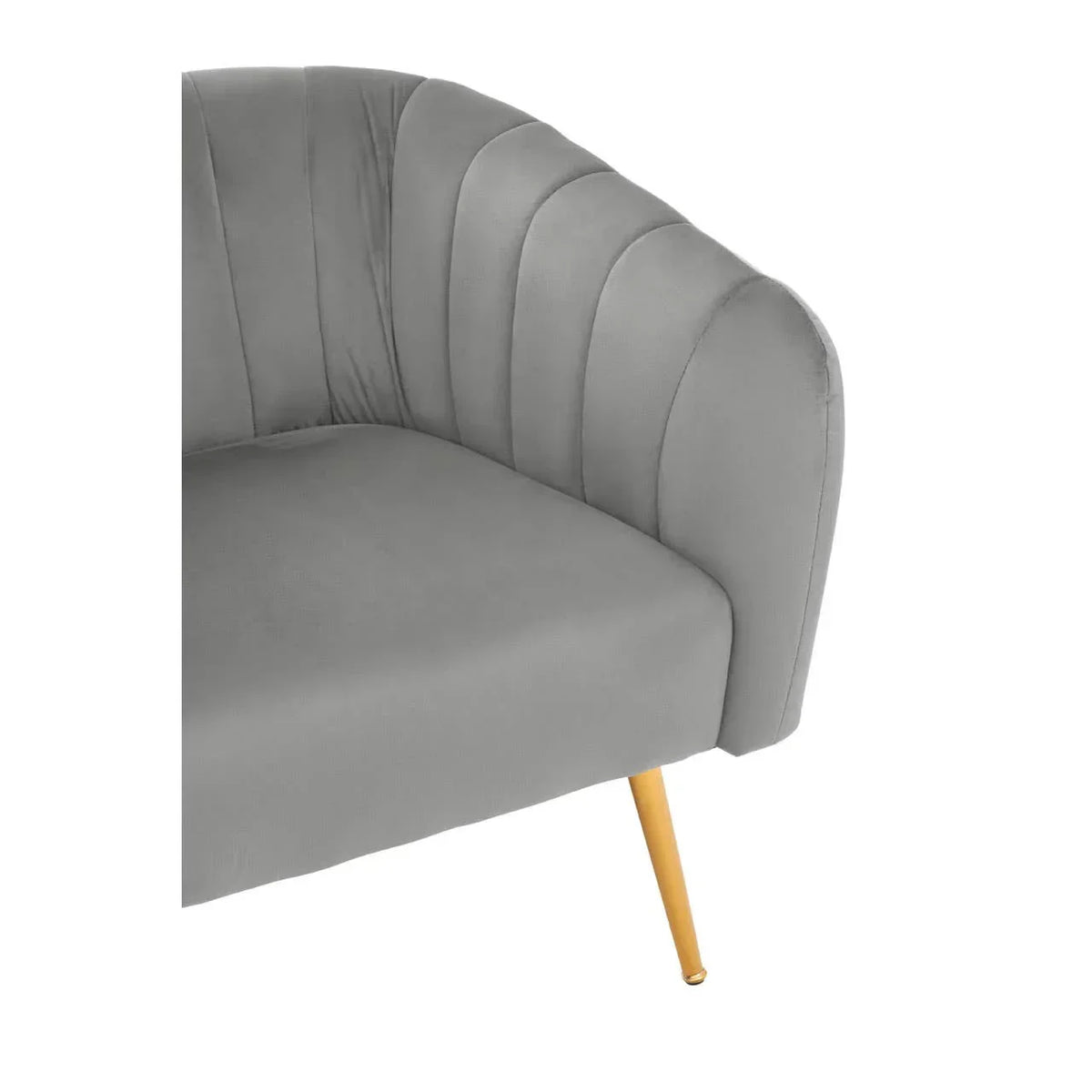 Grey velvet accent chair with curved backrest and gold metal leg close-up