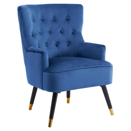 Blue velvet accent chair with tufted backrest and gold-tipped black wooden legs