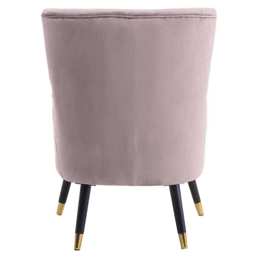 Back view of mauve velvet accent chair with black legs and gold metal feet