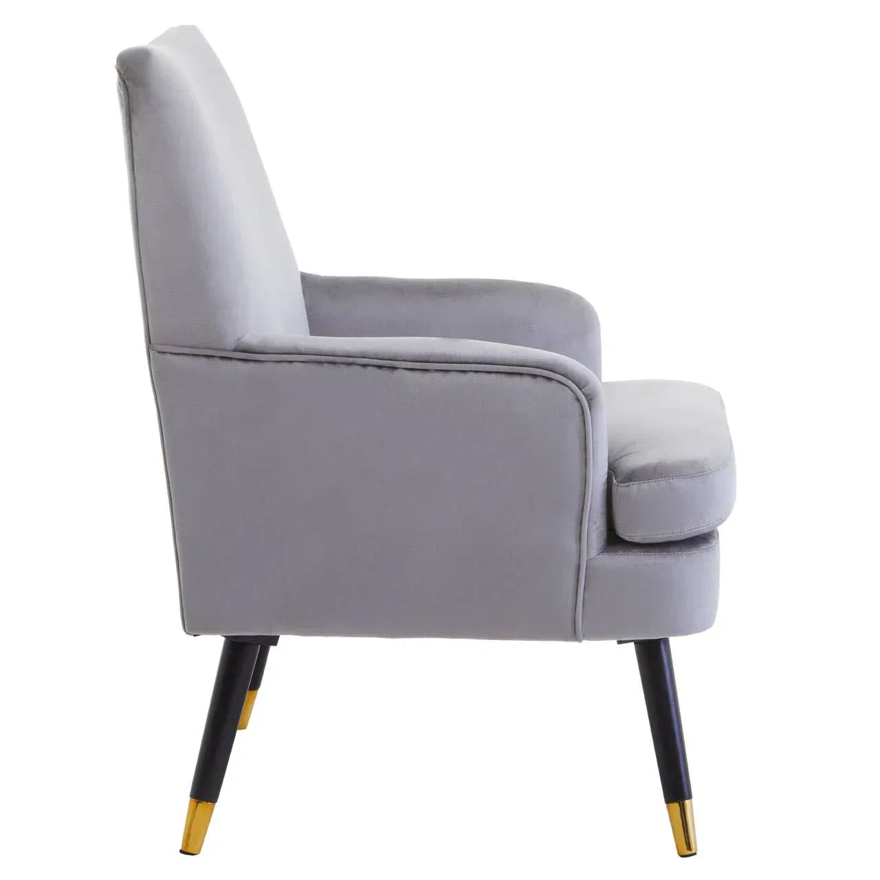 Side view of grey armchair with plush cushion and gold-tipped black legs