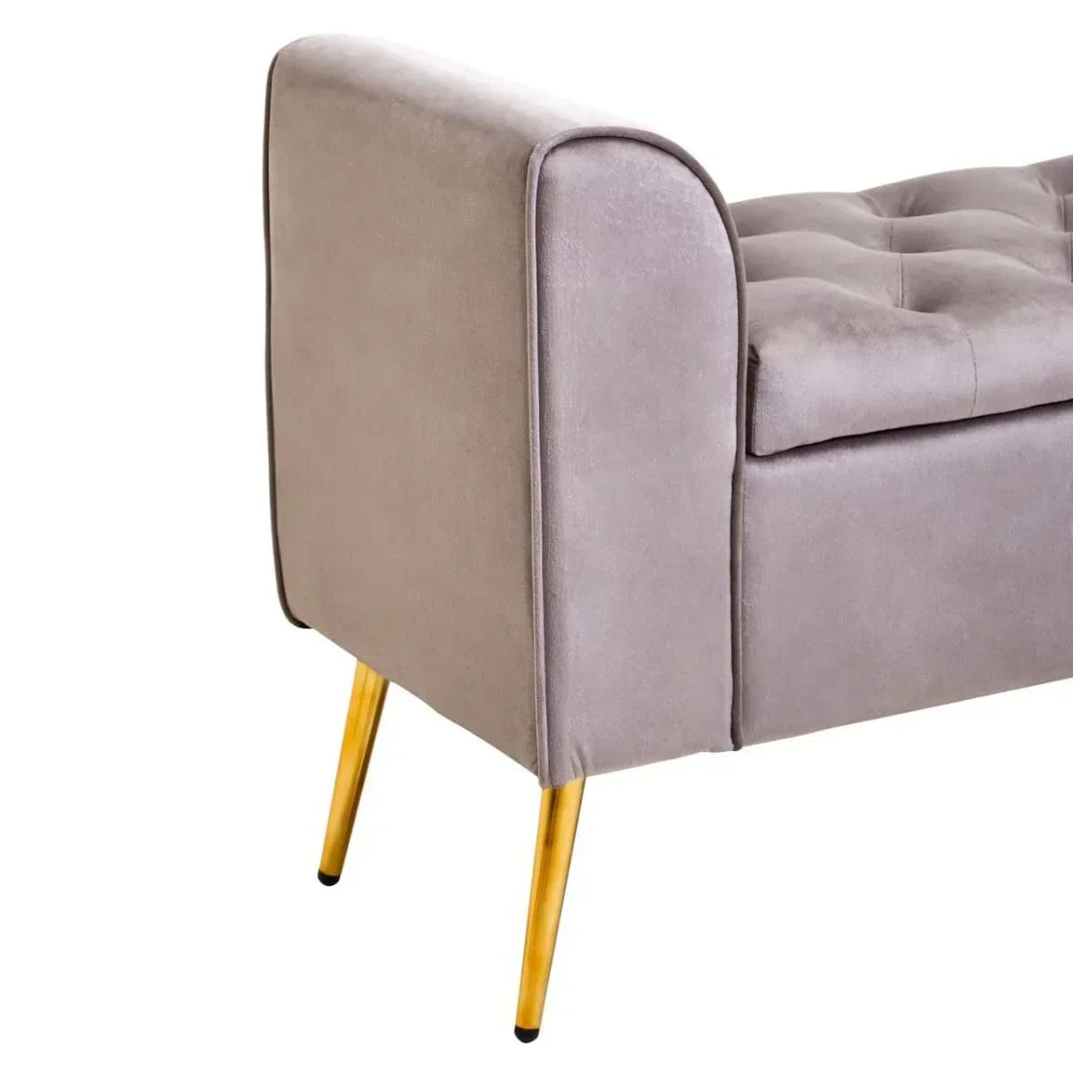 Grey velvet bench with tufted seat and gold metal legs, side angle view