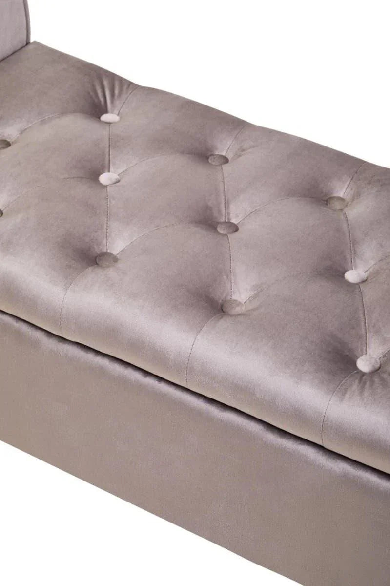 Close up of grey velvet ottoman bench with button-tufted seat upholstery