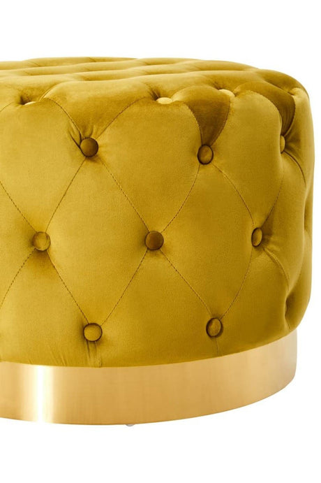 Pistachio green velvet stool featuring a tufted design and a matte gold finish base, showcasing a round shape and elegant texture