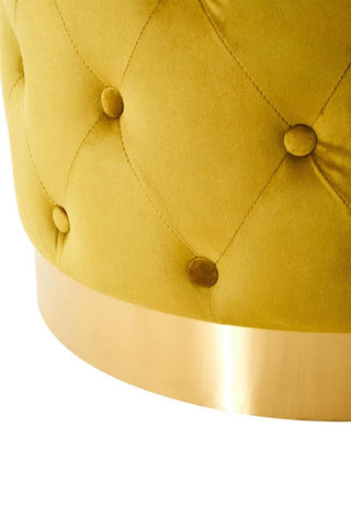 Pistachio green velvet stool featuring a tufted design and a matte gold finish base, showcasing a luxurious and modern aesthetic