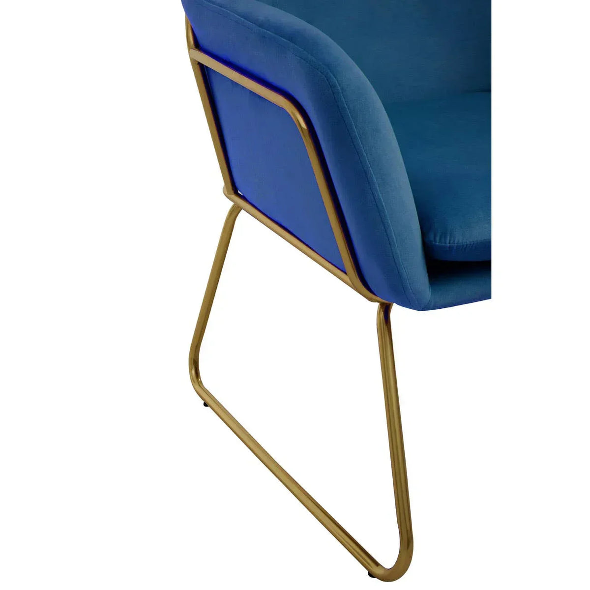 Blue velvet chair with gold metal frame and sled legs, close-up side view