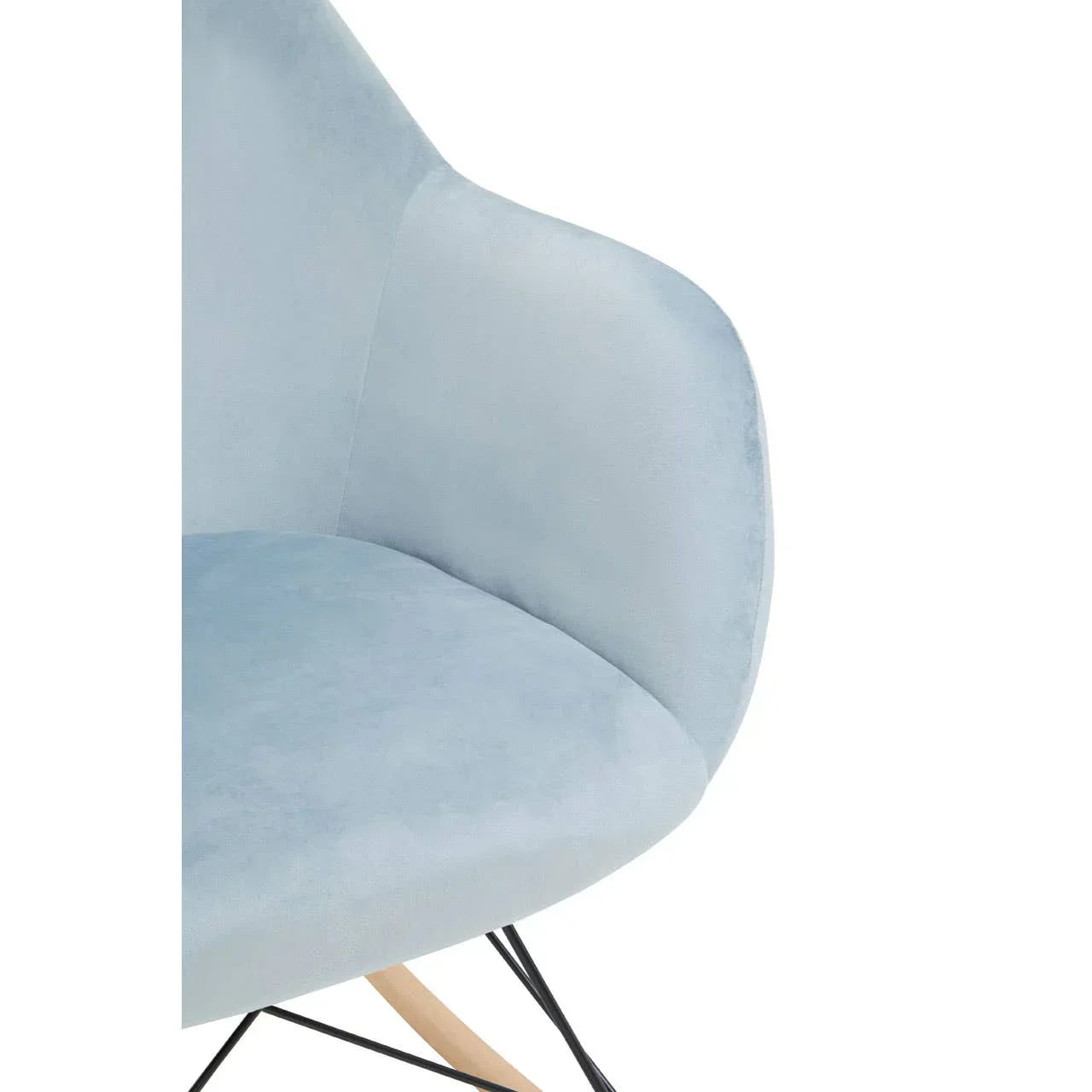 Light blue accent chair with curved back, soft upholstery, and angled wooden legs close-up