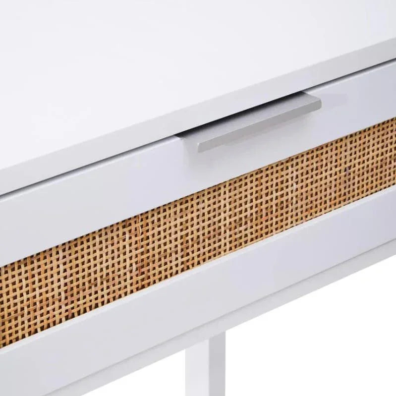 White desk with rattan drawer front and metal handle, modern home office furniture