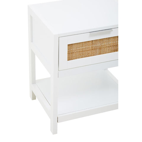 White wood side table featuring a single drawer with a rattan front and an open shelf below. The table has clean lines and a minimalist design, suitable for various home decor styles