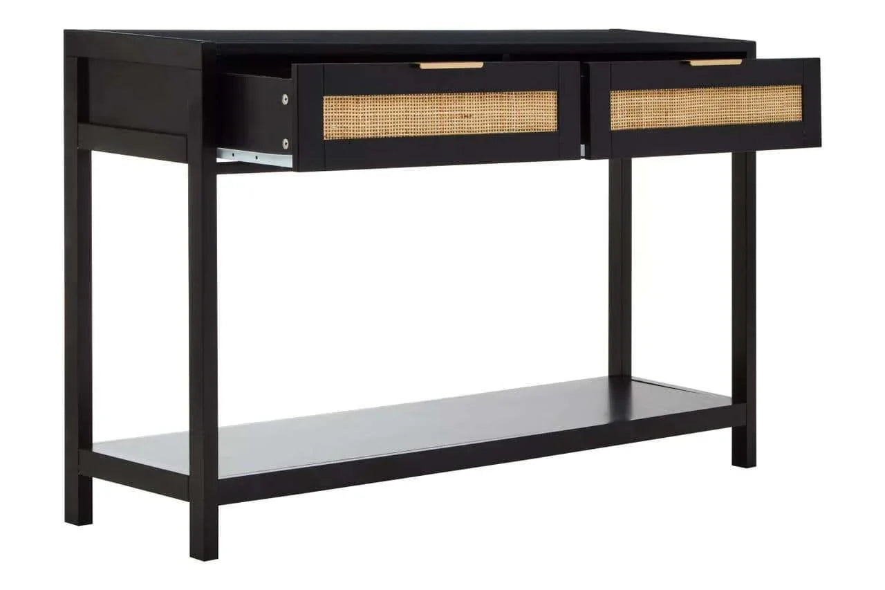 Black console table with cane front drawers and lower shelf, shown at an angle