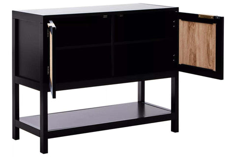 Black wood side cabinet with two doors, featuring a sleek design and a rattan interior. The cabinet has a smooth top surface and a lower shelf for additional storage. One door is open, showcasing the rattan texture inside. The cabinet stands on four legs, providing a modern and stylish look