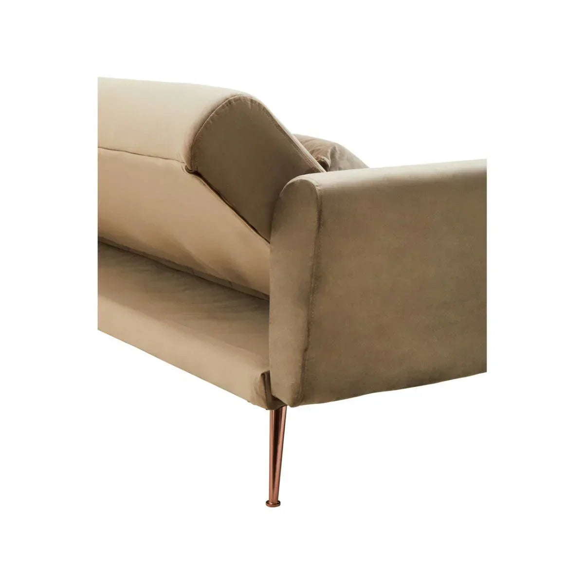 Beige velvet sofa with angled backrest and slim metallic leg, close-up side view